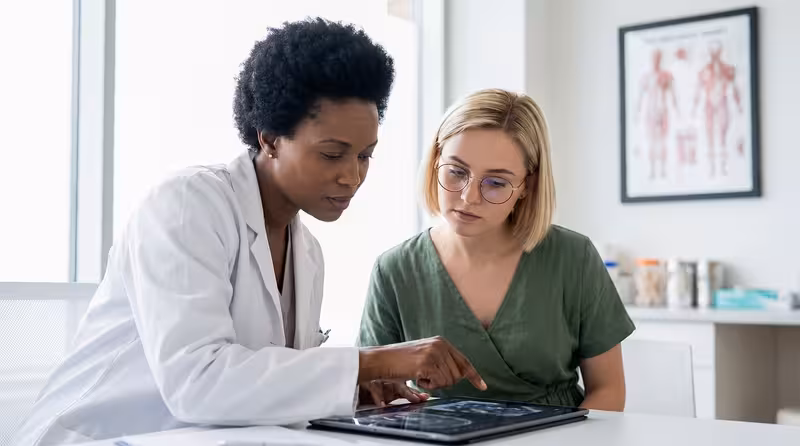 Doctor and patient consultation for Frequently asked questions about microsuction at our Oxford clinic - Oxford: Private Mic...