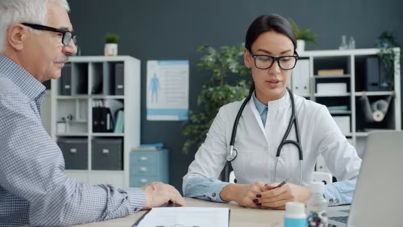 Doctor in clinic for Microsuction Compared with Ear Syringing - How To Head Over To Edgware: Private Microsuction Ear Wax Re...